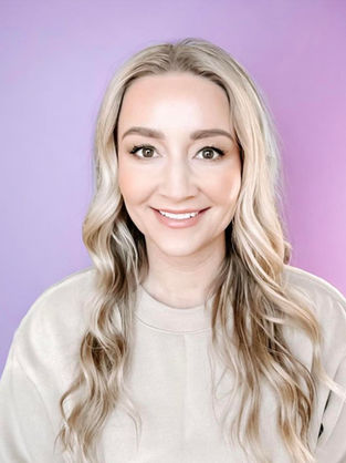 Social Media expert Magen Mintchev in a cream sweater with a soft purple background behind her
