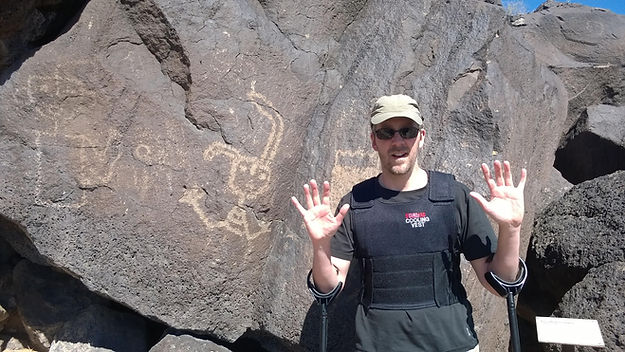 dave in cooling vest at petroglyphs.jpg