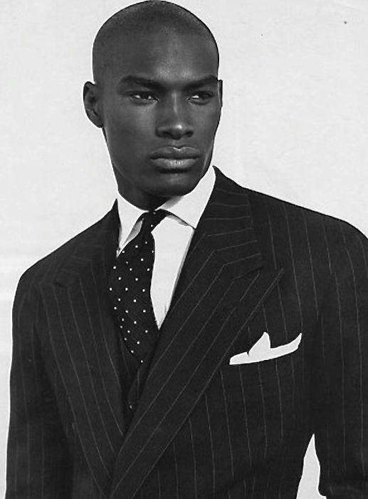 male model Tyson Beckford wearing a suit