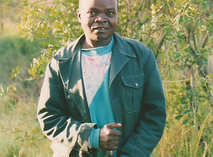 kenyan with buffalo rifle.jpg