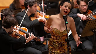 Annette with orchestra.jpeg