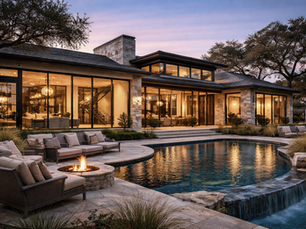 Modern Texas Hill Country luxury home at twilight featuring limestone walls, expansive floor-to-ceiling glass, open-concept interior, and resort-style pool terrace. Elegant contemporary architecture reflecting refined Luxury Construction in Texas and bespoke custom home design in San Antonio and the Texas Hill Country.