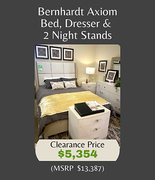 light gray upholsered bed with matching dresser and night stands