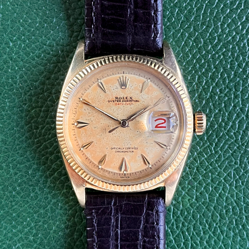 Rolex “Red Datejust” 18K bubbleback