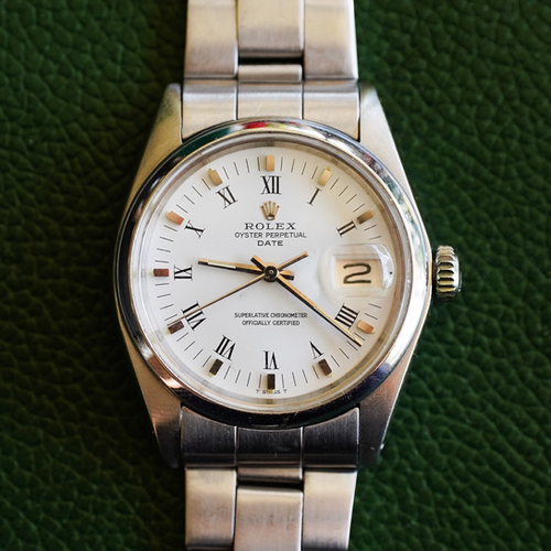 Rolex Oyster Perpetual Date White Roman Dial