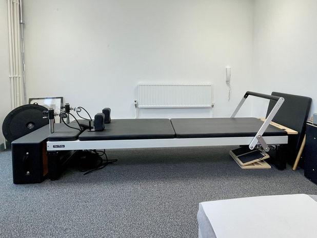  Image of a reformer Pilates equipment