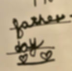 Handwritten "father day" in cursive with hearts on a white background, conveying a warm, celebratory mood.