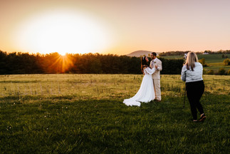 Videographer capturing wedding couple