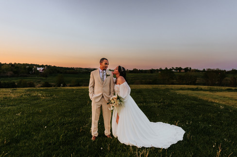 Sunset portrait of bride and groom