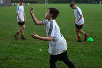 Boy throwing rigby ball