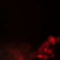 movement-red-smoke-black-background-with-copy-space-writing-text.jpg
