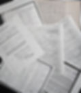 scattered docs for website photo.jpg