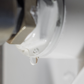 image of a pipe leaking water