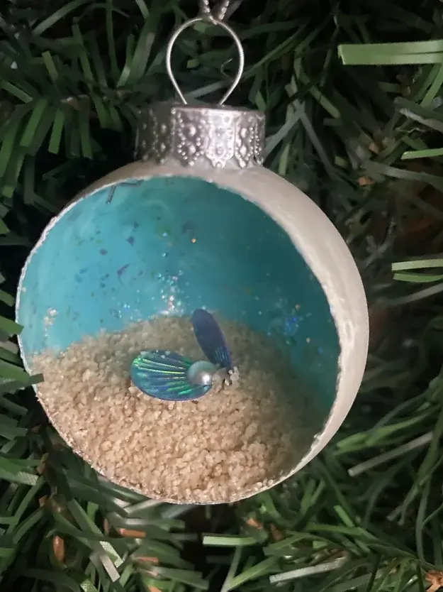 Pearl  in the sand  teal sea