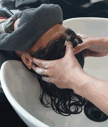 head-massage-at-sink.gif