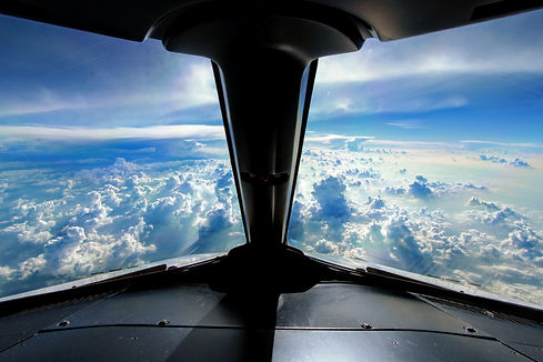 Perfect view from the cockpit, cruising Mexico with a few thunderstorms in the background.