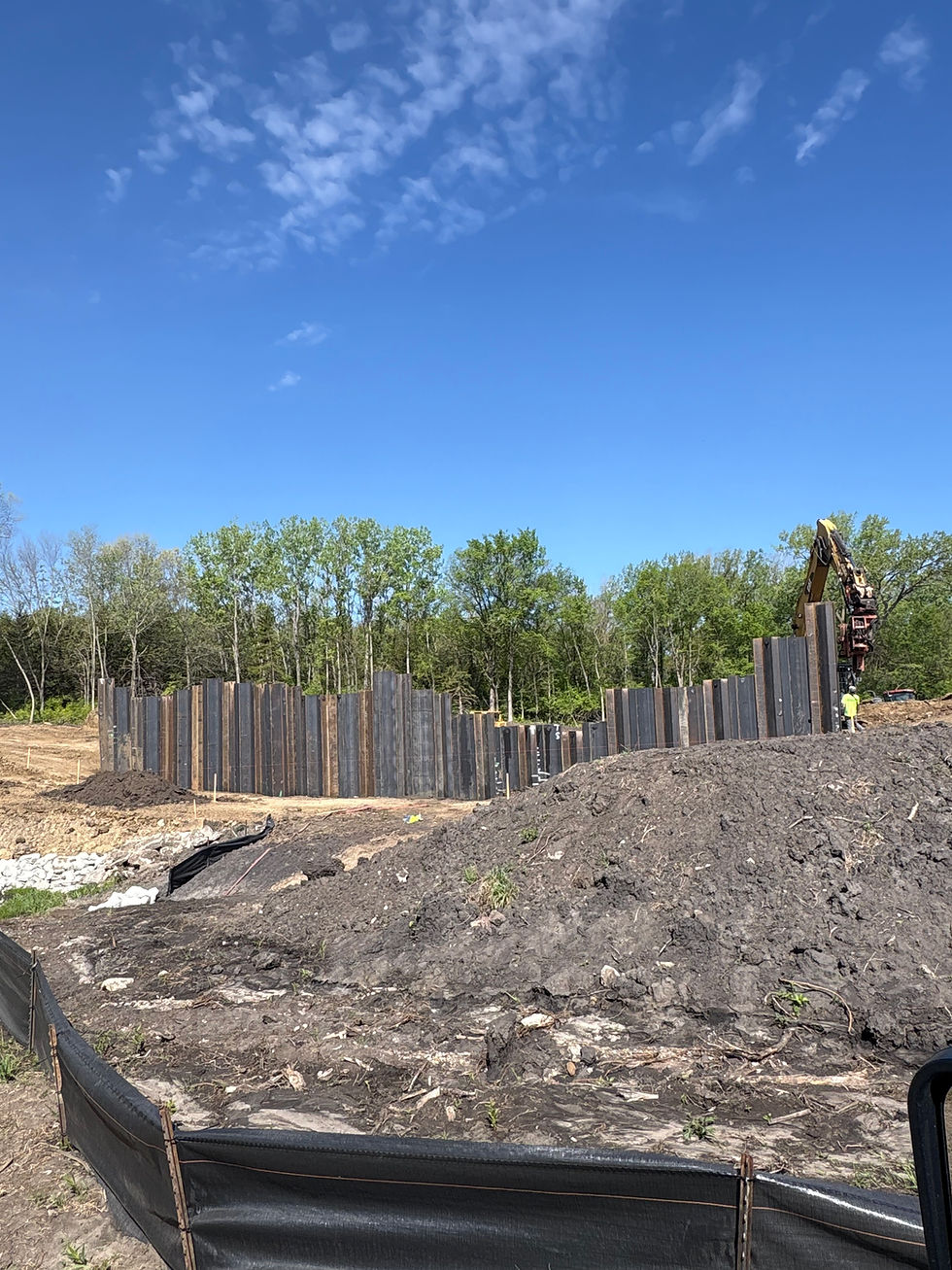 Construction site with curved foundation walls