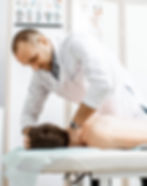 chiropractor doing manual therapy for neck pain relief