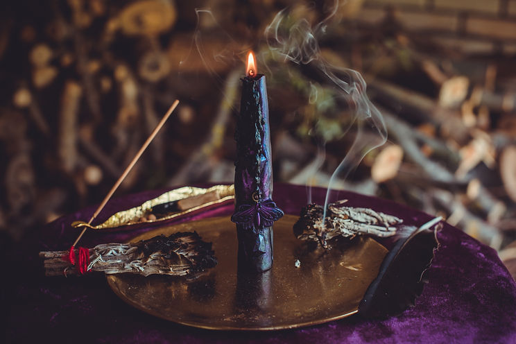 Black Ritual Candle Burning During Full Moon Esoteric Metamorphosis Ceremony.jpg