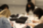 example of a classroom of students taking an in person calligraphy engraving class in atlanta