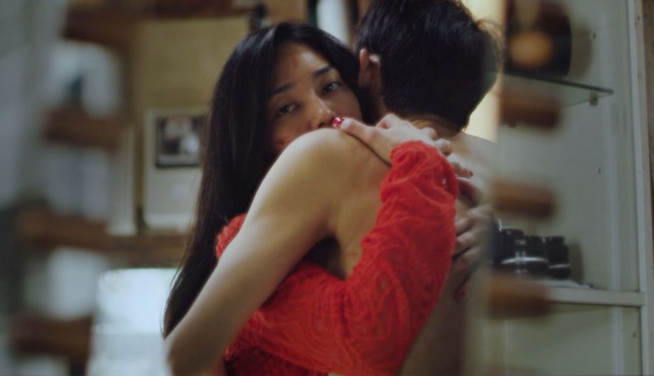 Woman of the Photographs