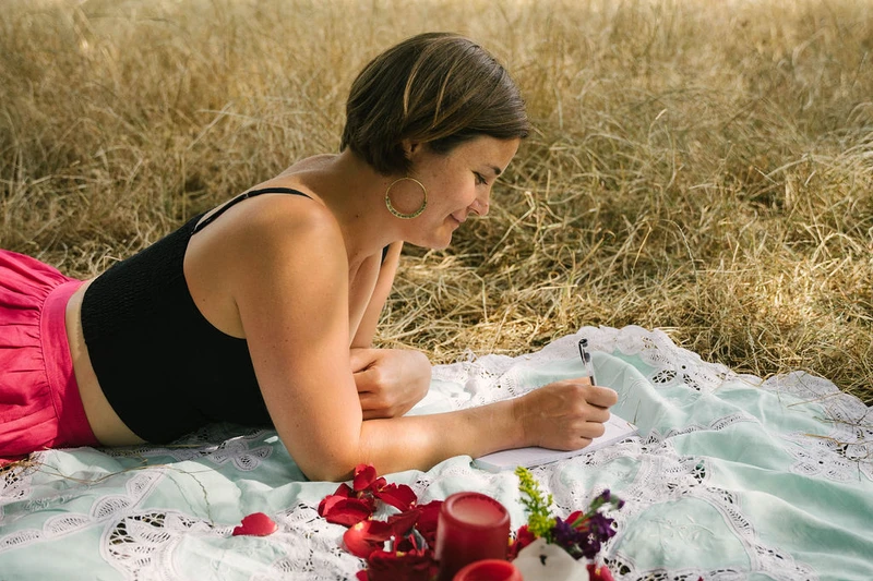 Picture of girl journaling her menstrual cycle