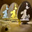 Miniatura: Elegante lampada pasquale in legno a forma di uovo con intaglio di coniglietto e farfalle, illuminata con luce soffusa.