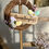 Miniatura: Ghirlanda di Pasqua artigianale in vimini con scritta “Buona Pasqua”, ovetti e margherite