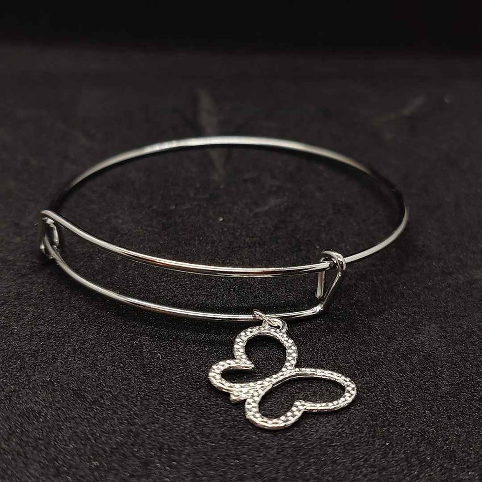 Miniatura: Pulsera plateada con una mariposa de colgante