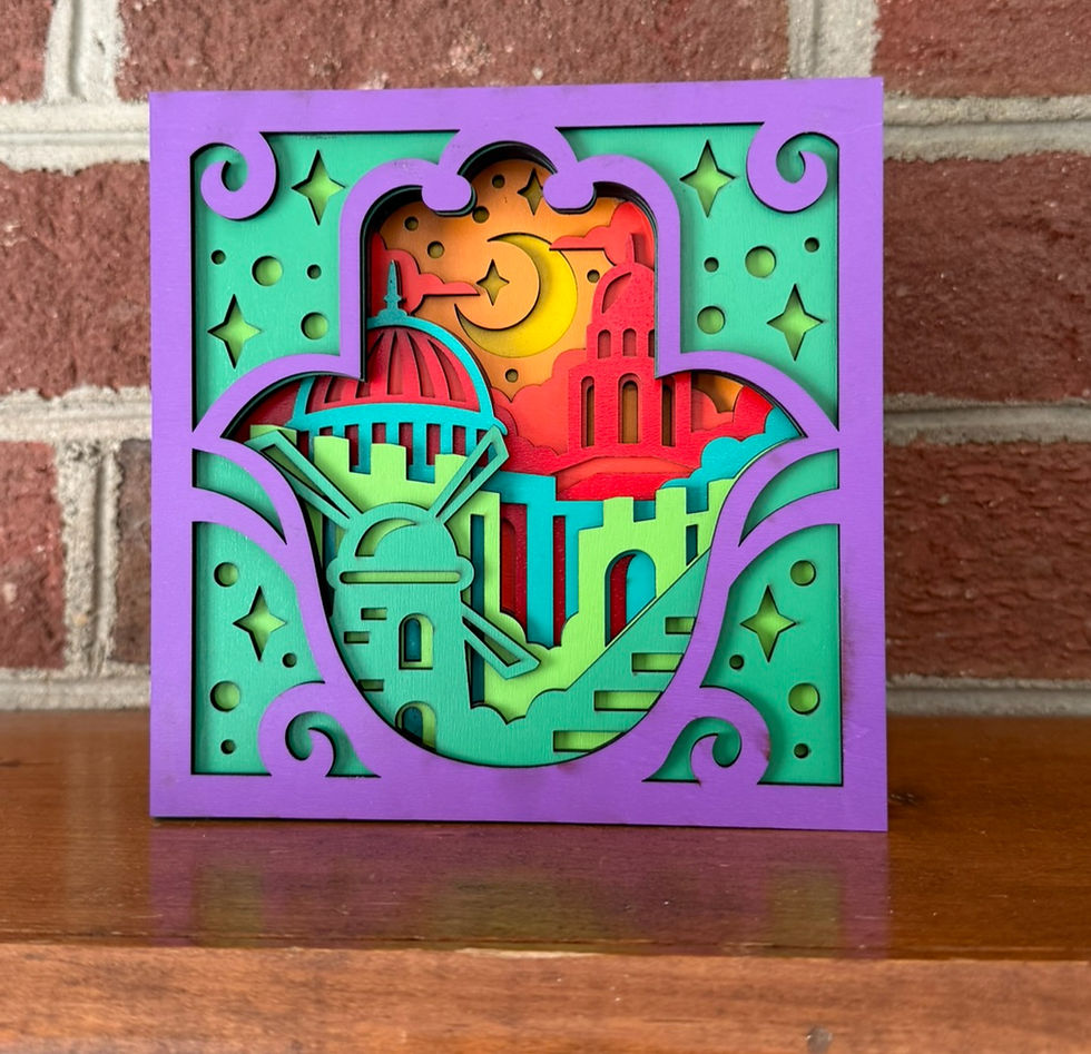 Colorful layered wood Hamsa sign with Jerusalem skyline