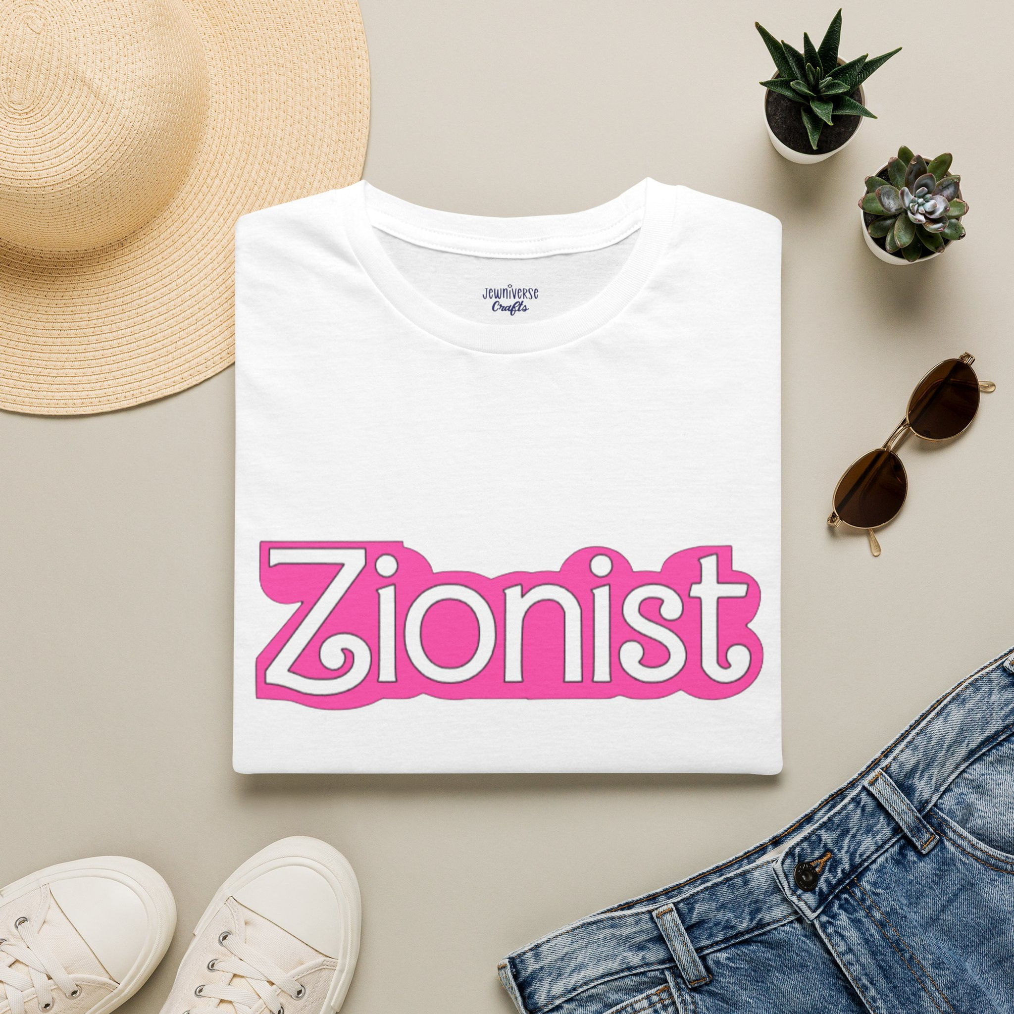 Folded white t-shirt with pink Zionist text