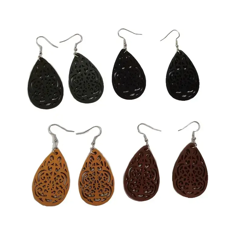 Thumbnail: Bohemian Carved Hollow Leaf Shaped Dangle Earrings