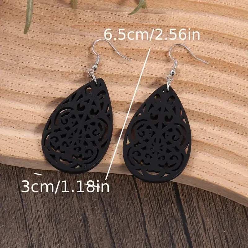 Thumbnail: Bohemian Carved Hollow Leaf Shaped Dangle Earrings