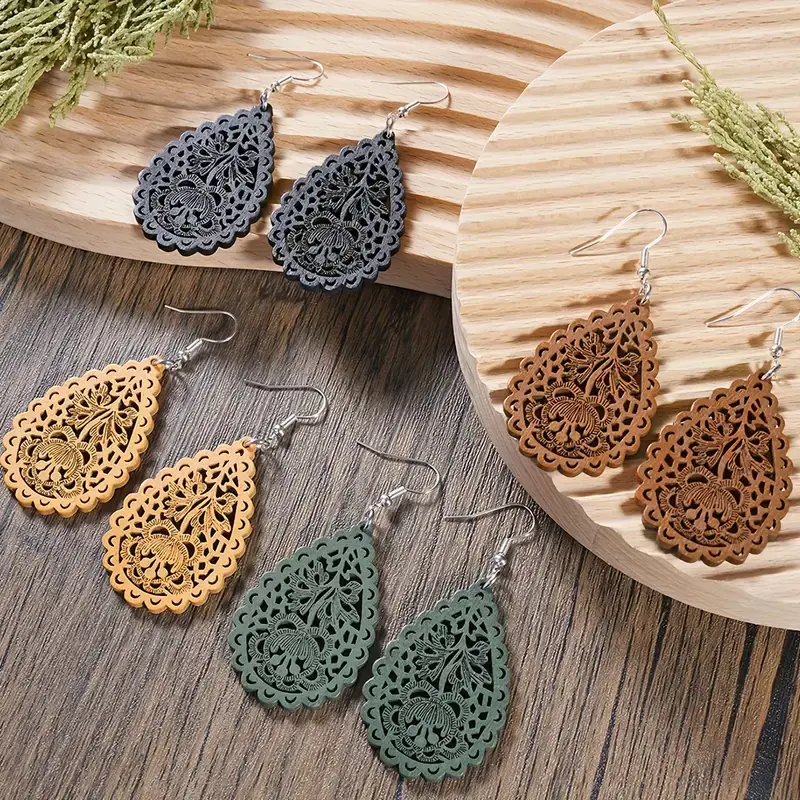 Thumbnail: Bohemian Carved Hollow Leaf Shaped Dangle Earrings