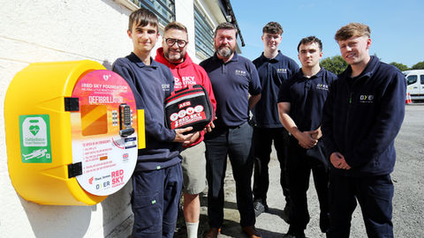 Dyer Apprentices Help Deliver Community Defibrillator
