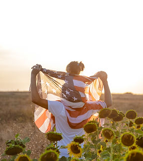 happy-family-with-american-flag-sunset.jpg