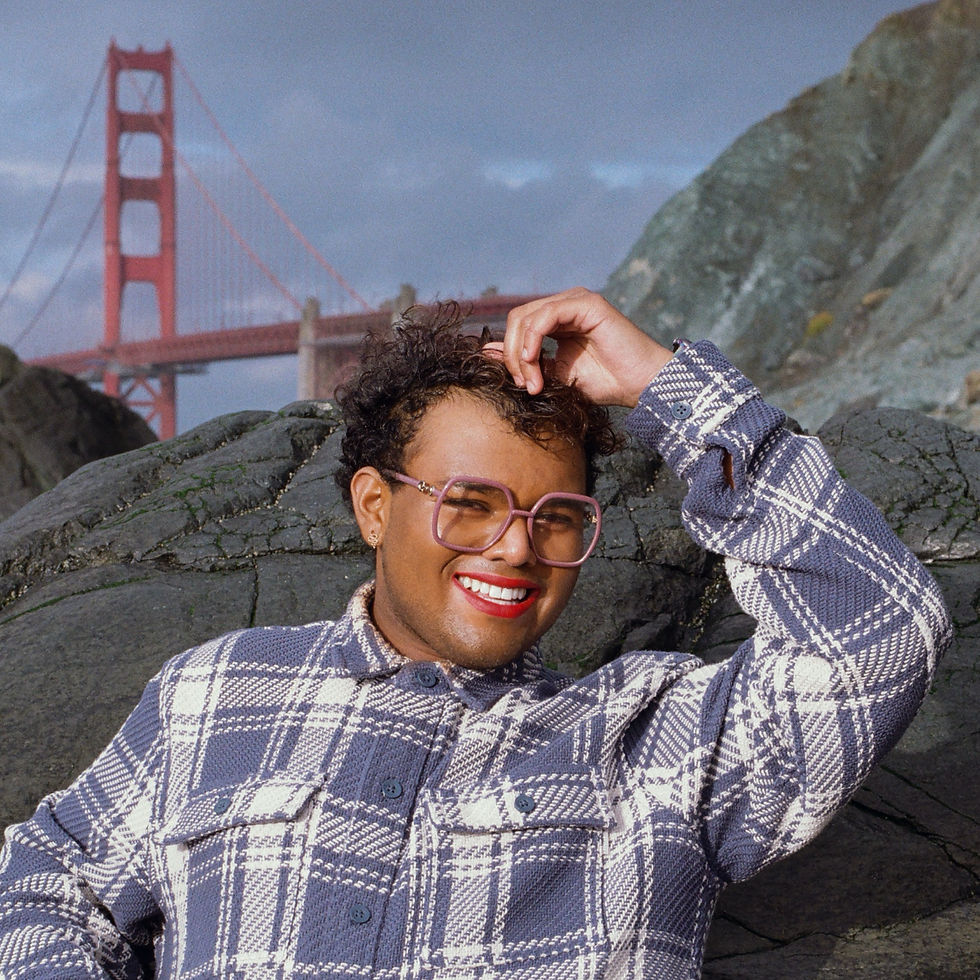 Gabe Kanae smiles during a photo shoot in San Francisco for his album “Juno & Solina.”