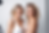 two woman smiling at a boudoir photography session