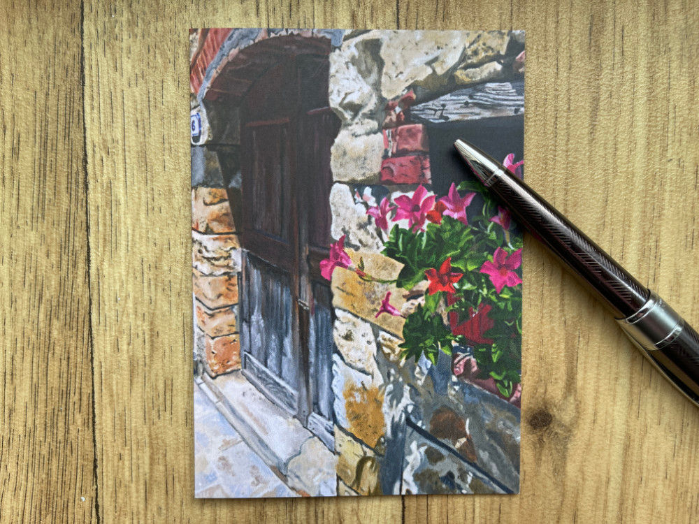 A greetings card of an oil painting of a old weathered door in Tuscany