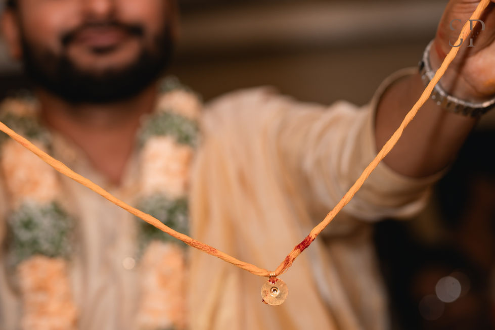 the sacred thread that will soon bind two lives is displayed for everyone to witness,