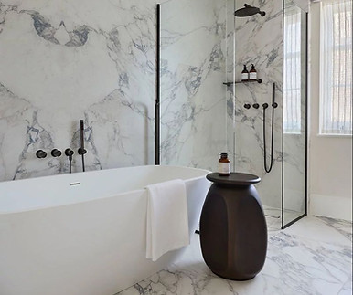 Marble bathroom with freestanding tub and glass shower, complete 5-day renovation