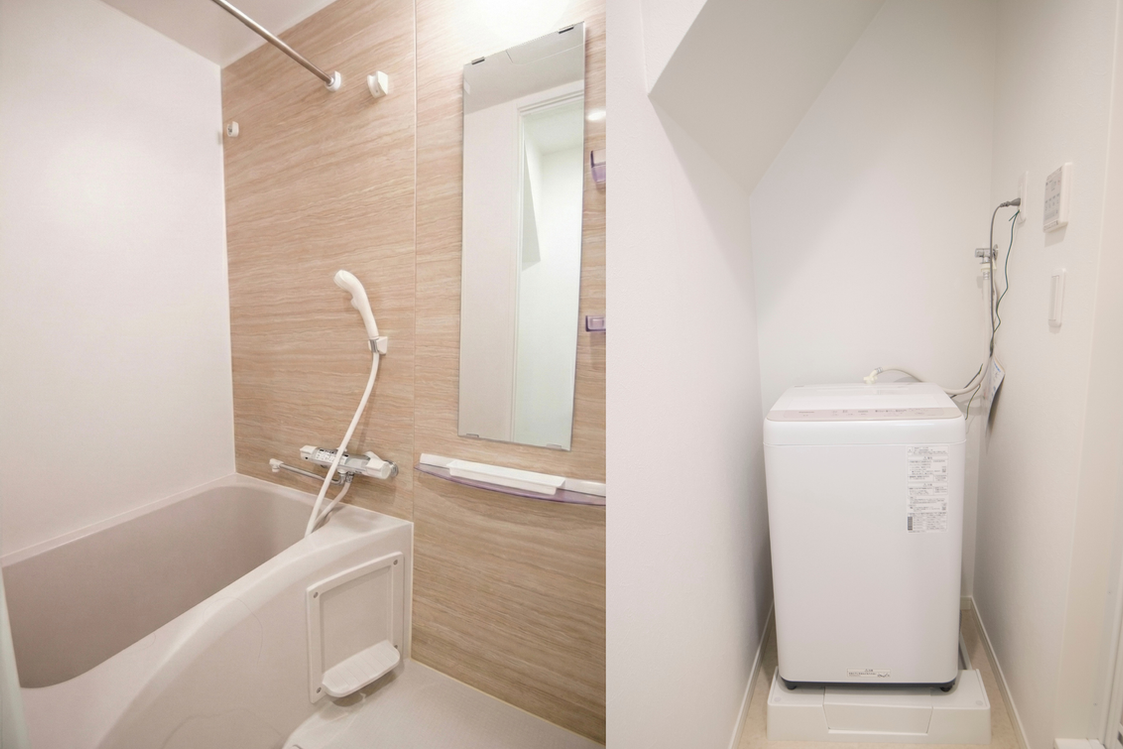 Clean Japanese bathroom with a deep soaking bathtub and modern fixtures and Private in-unit washing machine and laundry area in a Lohus serviced residence Tokyo hatsudai Apartment.