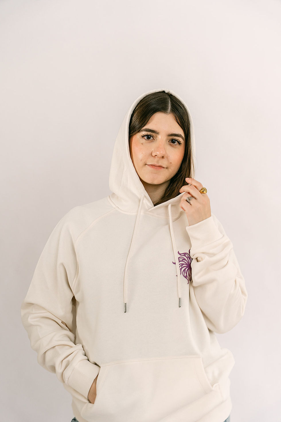 Woman wearing a fleece Decent Threads hoodie