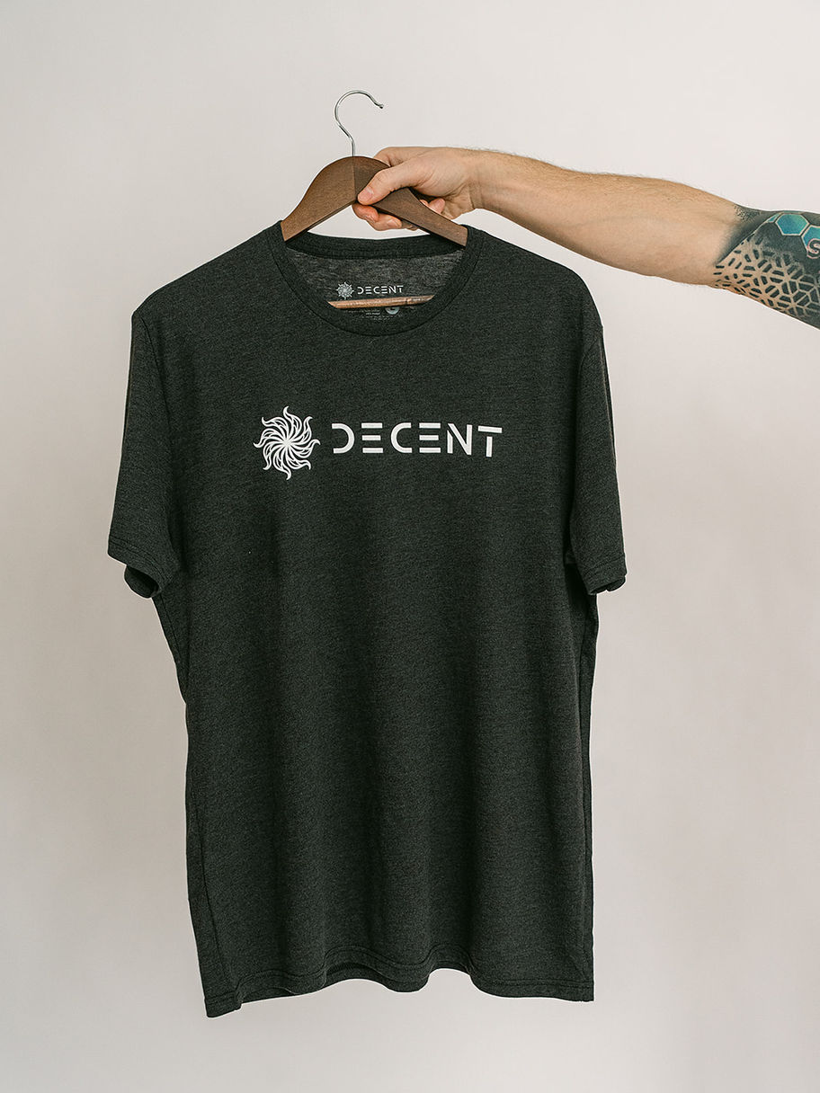 Dark t-shirt with Decent Threads logo, held by hand