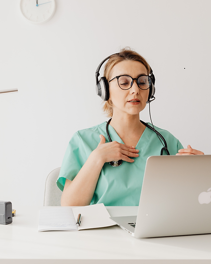 Healthcare professional in scrubs on a virtual call