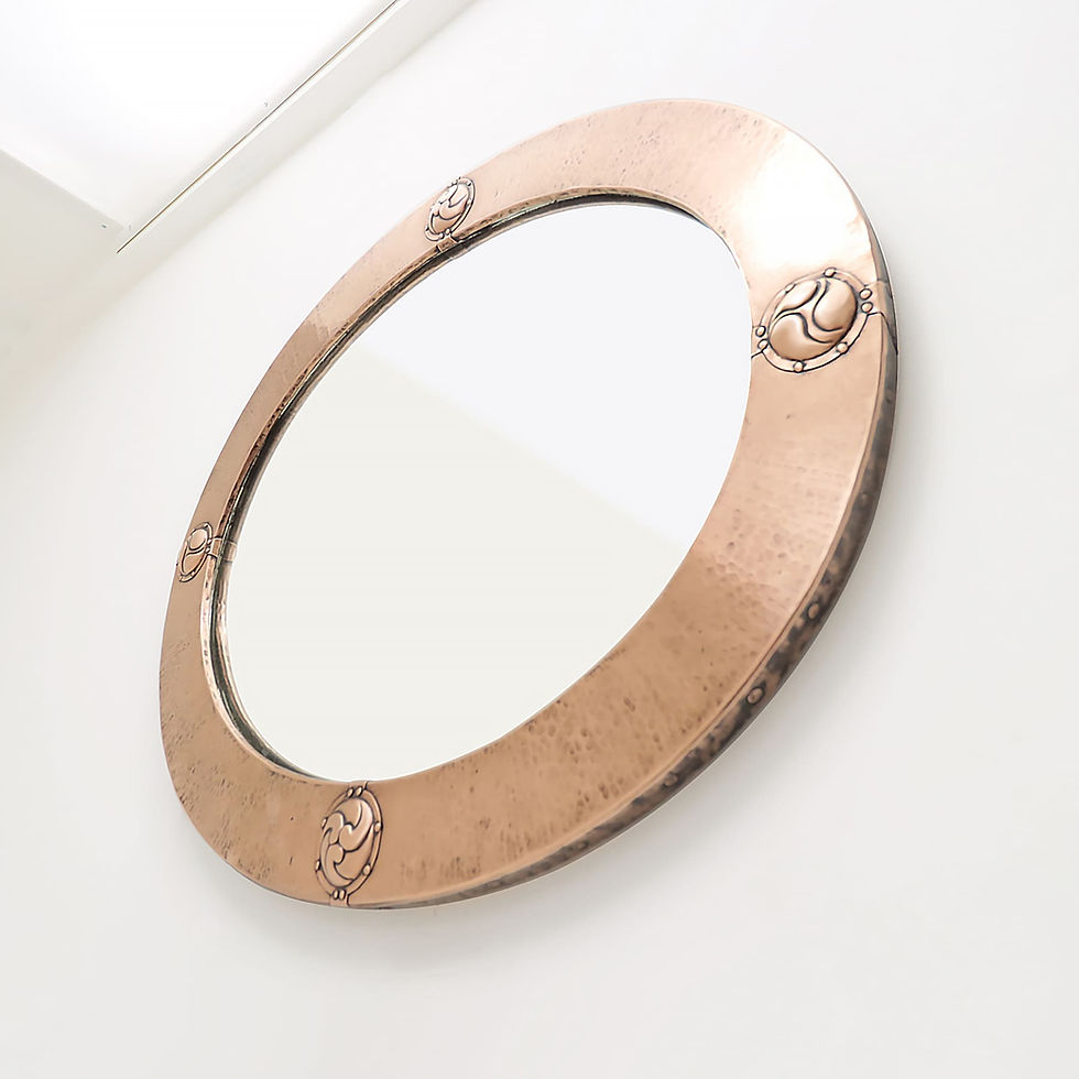 Thumbnail: Antique hammered copper mirror.