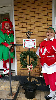 Members dressed as elves