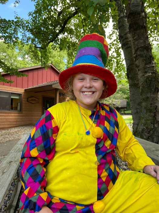 Camper dressed up in a clown costume