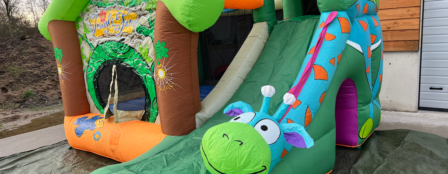 Bunte Hüpfburg Dino mieten für Kinbderfeste und Geburtstage bei Hopp Hopp Events in Bielefeld