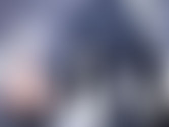 Redundancy. Restructure. Man in a suit moving images of employees around a screen.